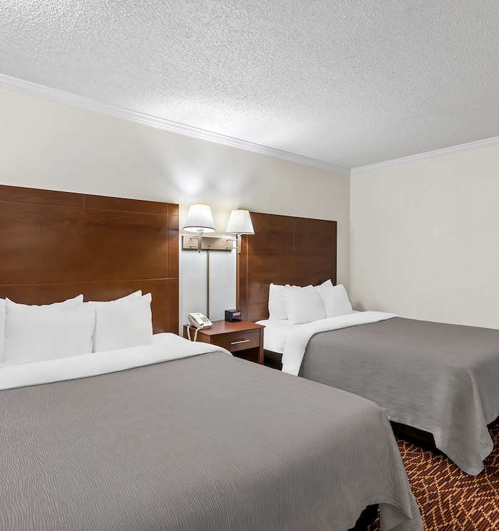 Two Queen Bed Guest Room at Georgia Hotel Two Queen Bed Guest Room at Georgia Hotel